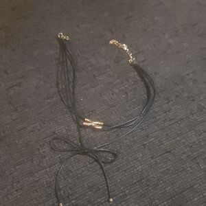 Elegant Black Necklace with Gold Accents